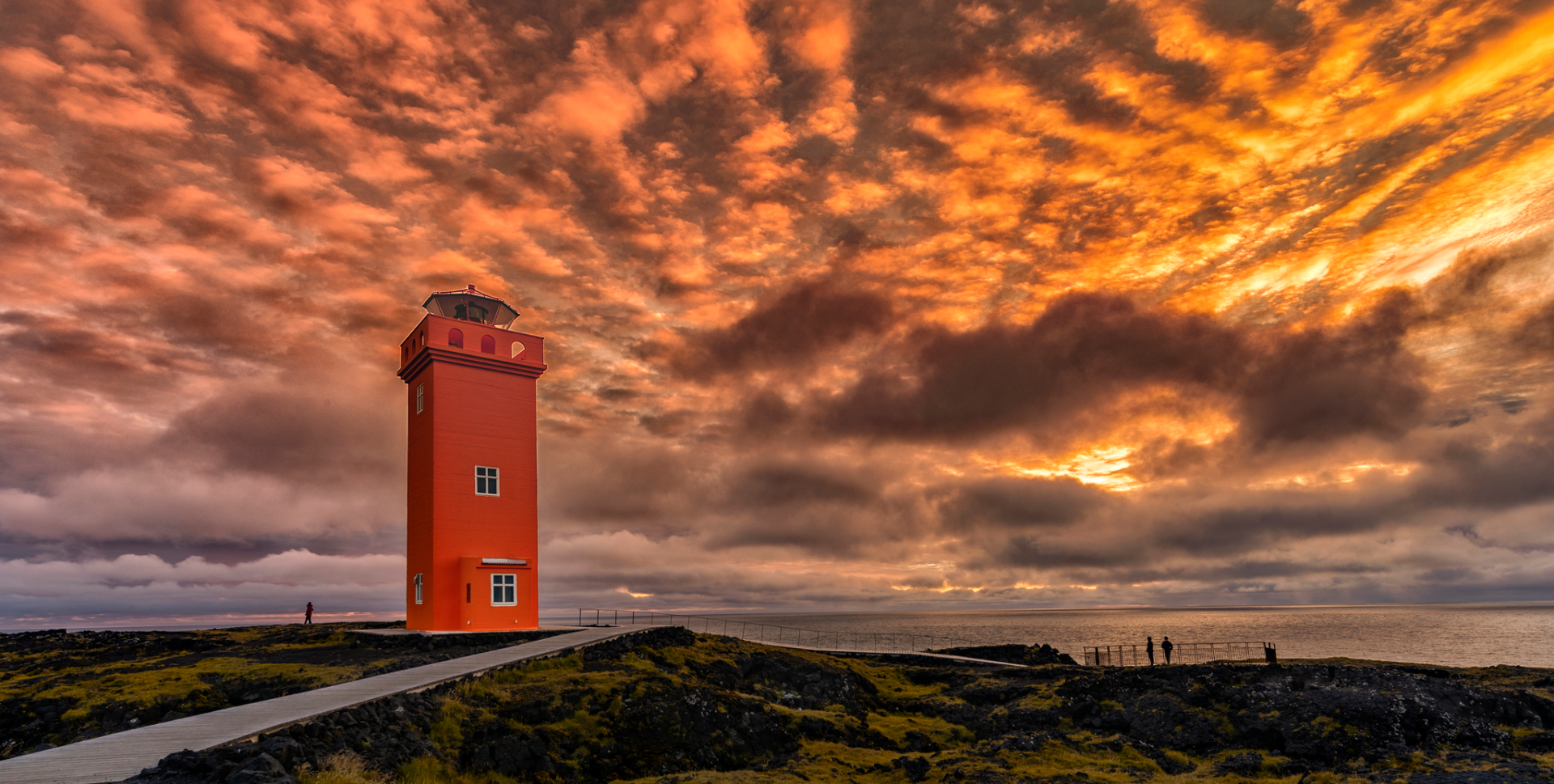 Golden sky over lighthouse